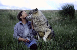 Dr. Susan Eirich with wolf at EarthFire Sanctuary