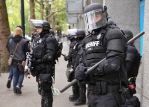 Photo of police in riot gear