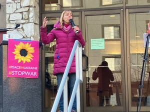 Medea Benjamin speaking outside cancelled event venue in Seattle