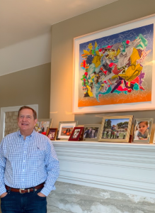 Jordan Schnitzer at home with a Lumeria series Frank Stella print Jordan Schnitzer at home with a Lumeria series Frank Stella print