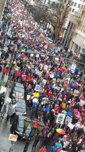 photo of thousands of people filling downtown Portland for Womens March