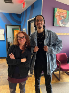 Word is Bond: Mentoring the Next Generation of Leaders two people smiling in a radio studio lobby