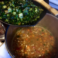 Stirring Collards into Soup Stirring Collards into Soup